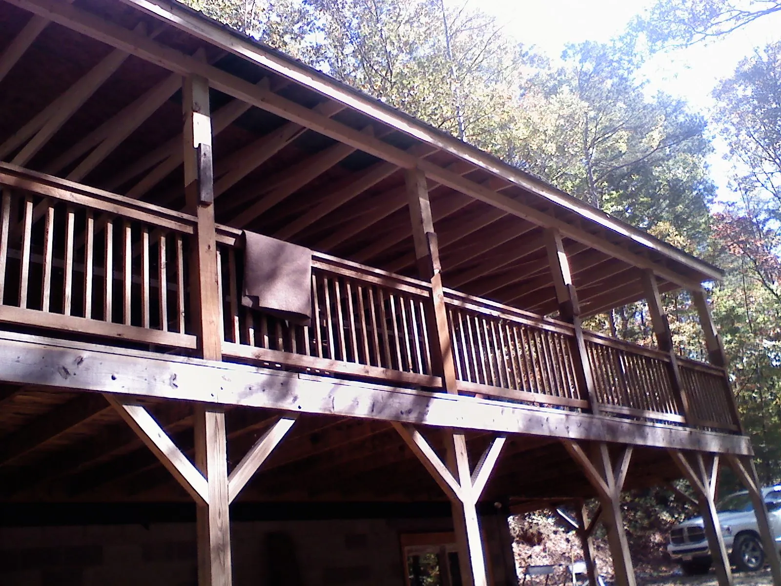 Timber framing under a new elevated porch and deck — Roof Leak Repair in Alplaus by Roofing Brothers